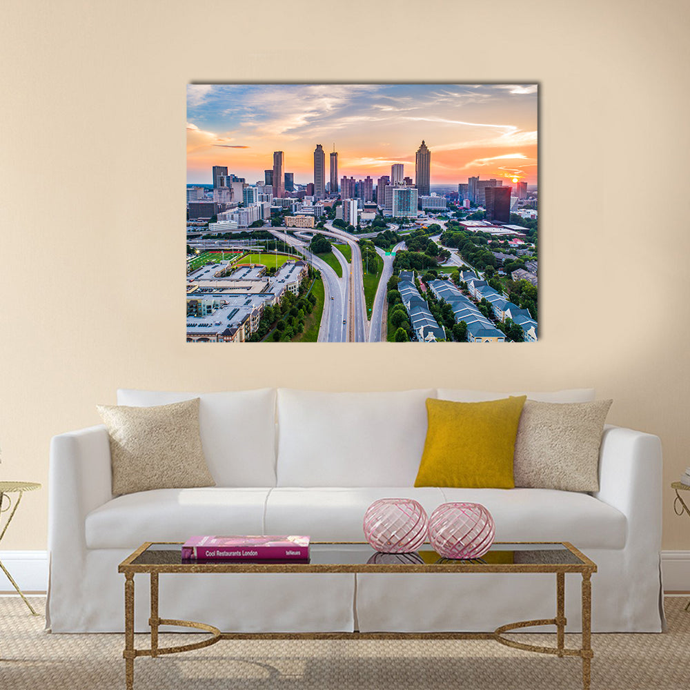 Atlanta In Georgia Skyline Canvas Wall Art in orange, green and blue, single panel hung on a wall