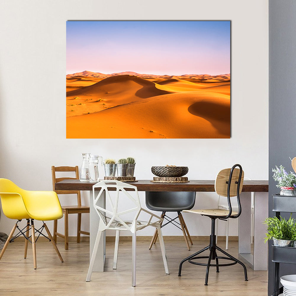 Sahara Sand Dunes at Golden Hour Canvas Wall Art in orange, yellow and blue, single panel hung on a wall