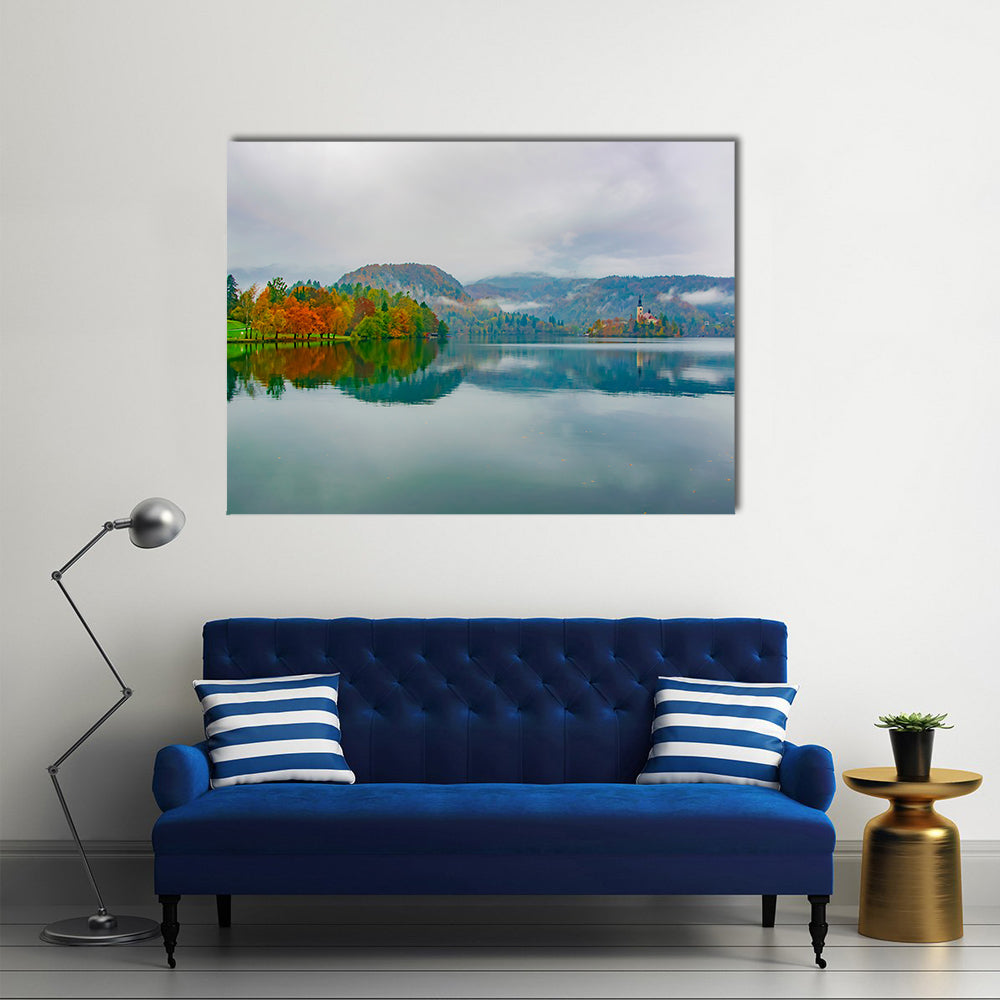 Autumn at Bled Lake, Slovenia Canvas Wall Art in gray, orange and blue, single panel hung on a wall