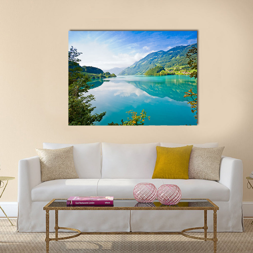 Majestic Mountain Lake In Switzerland Canvas Wall Art in green and blue, single panel hung on a wall