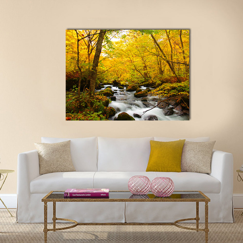 Autumn Colors Of Oirase River Canvas Wall Art in brown, yellow and green, single panel hung on a wall