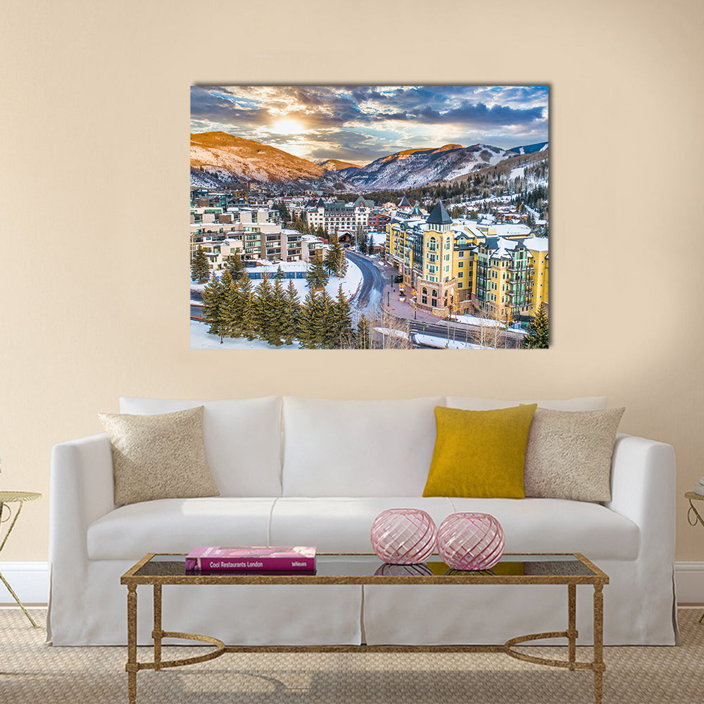 Vail Downtown In Colorado Canvas Wall Art in white, yellow and blue, single panel hung on a wall