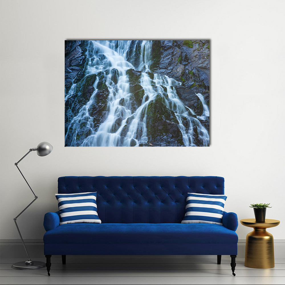 Balea Cascada Waterfall, Romania Canvas Wall Art in black, white and blue, single panel hung on a wall