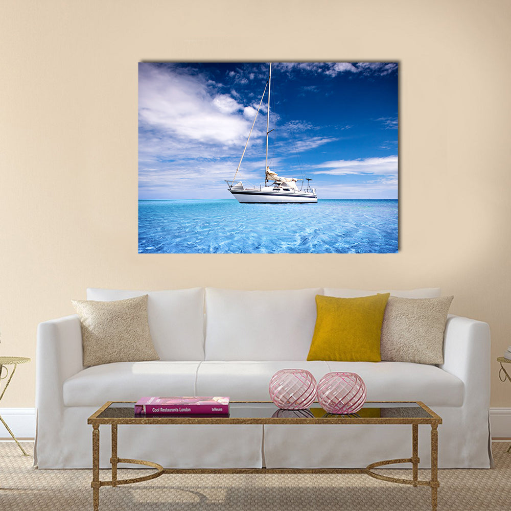 Single-masted White Sailboat on Turquoise Water Canvas Wall Art