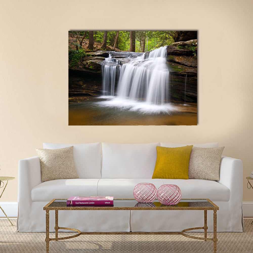 Cascading Forest Waterfall Over Layered Rocks Canvas Wall Art