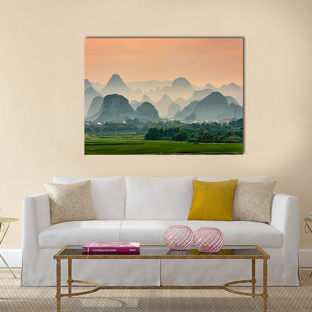 Karst Mountain In Guilin China Canvas Wall Art in gray, orange and green, single panel hung on a wall