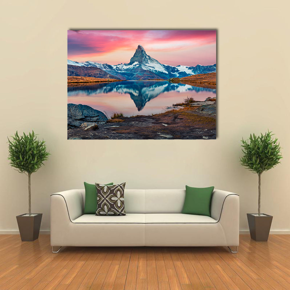Stellisee Lake With Matterhorn Peak Canvas Wall Art in orange, blue and pink, single panel hung on a wall