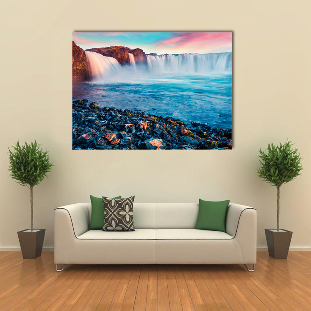Skjalfandafljot River And Godafoss Waterfall In Iceland Canvas Wall Art in brown, blue and pink, single panel hung on a wall