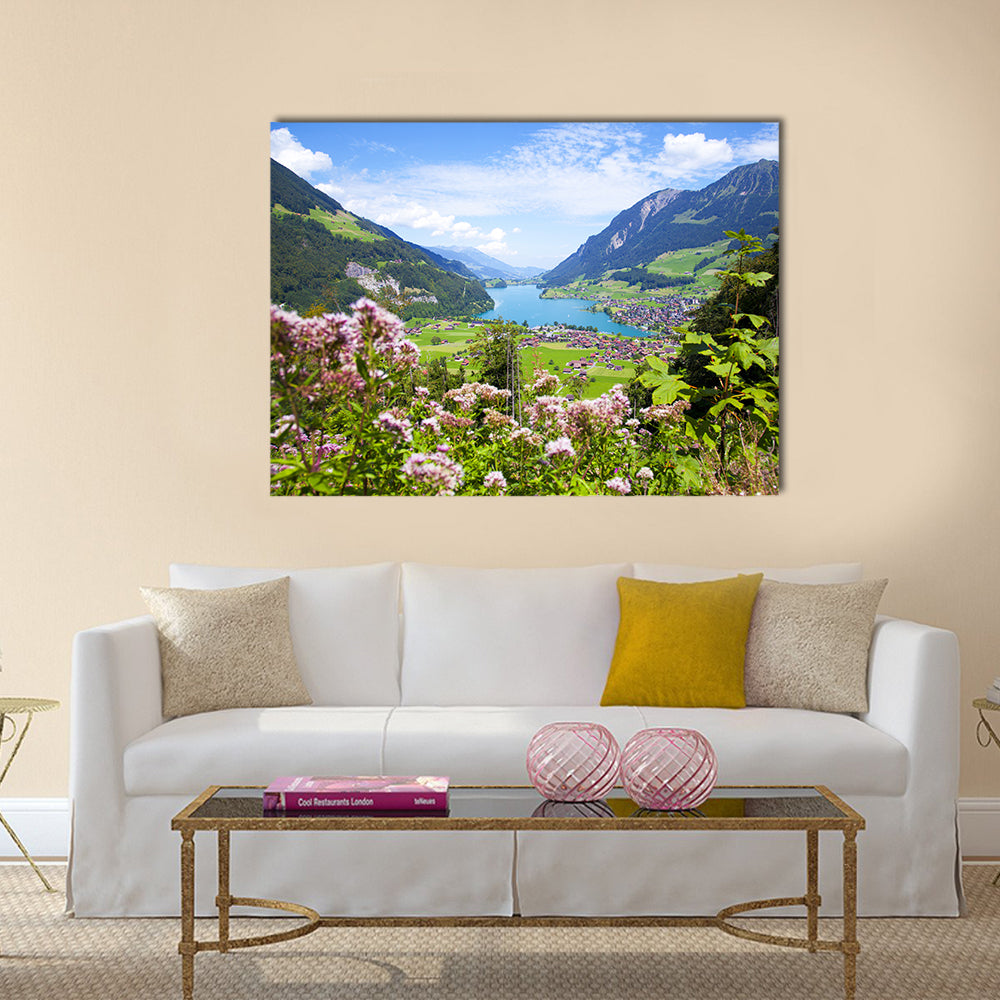 Summer Landscape In Lungern Village Canvas Wall Art in green and blue, single panel hung on a wall