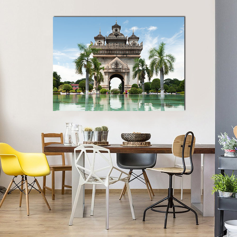 Patuxai Victory Gate in Vientiane Canvas Wall Art in gray, green and blue, single panel hung on a wall