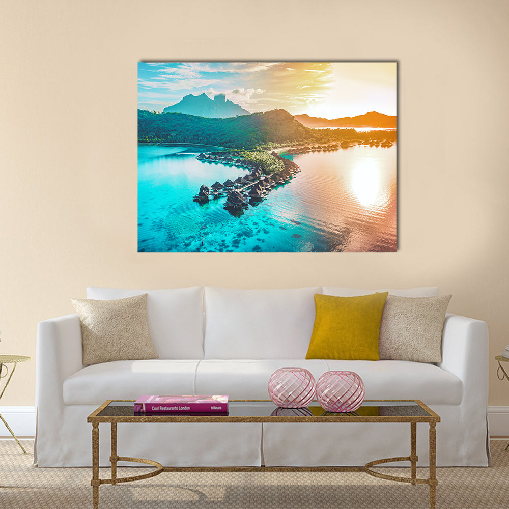 Bora Bora Overwater Bungalows at Sunset Canvas Wall Art in orange, yellow and blue, single panel hung on a wall