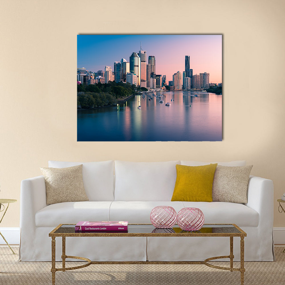 Brisbane Downtown At Sunrise Canvas Wall Art in orange, blue and pink, single panel hung on a wall