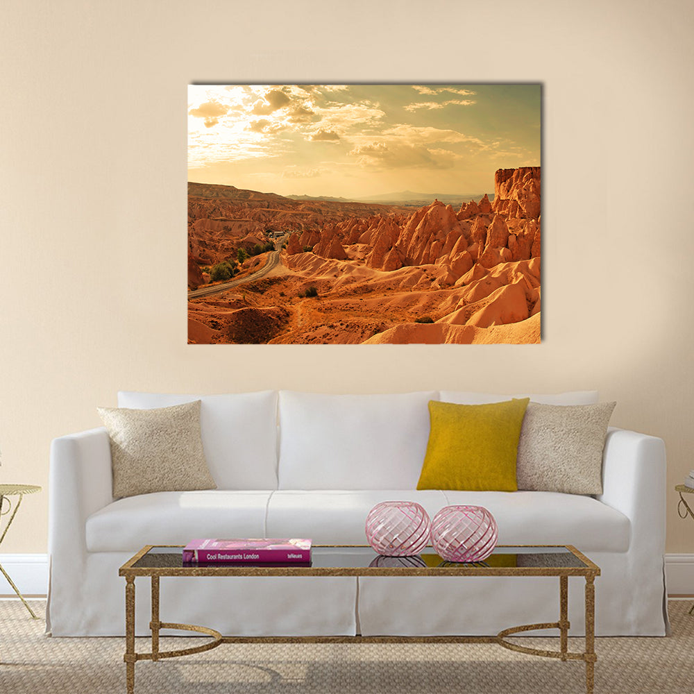 Amazing Stone Formations In Cappadocia Canvas Wall Art in brown, orange and yellow, single panel hung on a wall