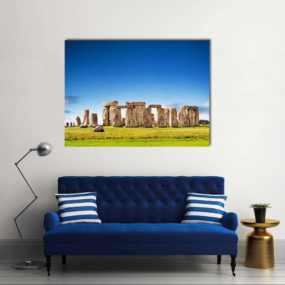 Stonehenge Stone Circle in England Canvas Wall Art in gray, green and blue, single panel hung on a wall