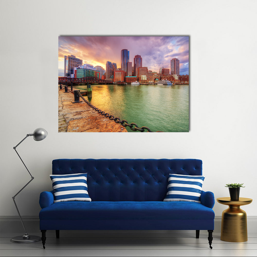 Boston Harbor Skyline at Sunset Canvas Wall Art in orange, blue and purple, single panel hung on a wall