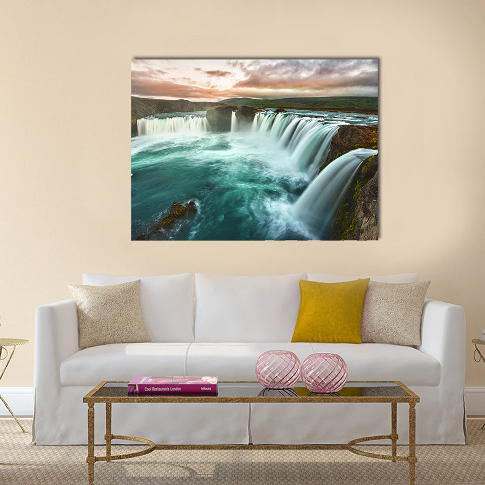 Godafoss Waterfall at Sunset Canvas Wall Art in white, orange and blue, single panel hung on a wall