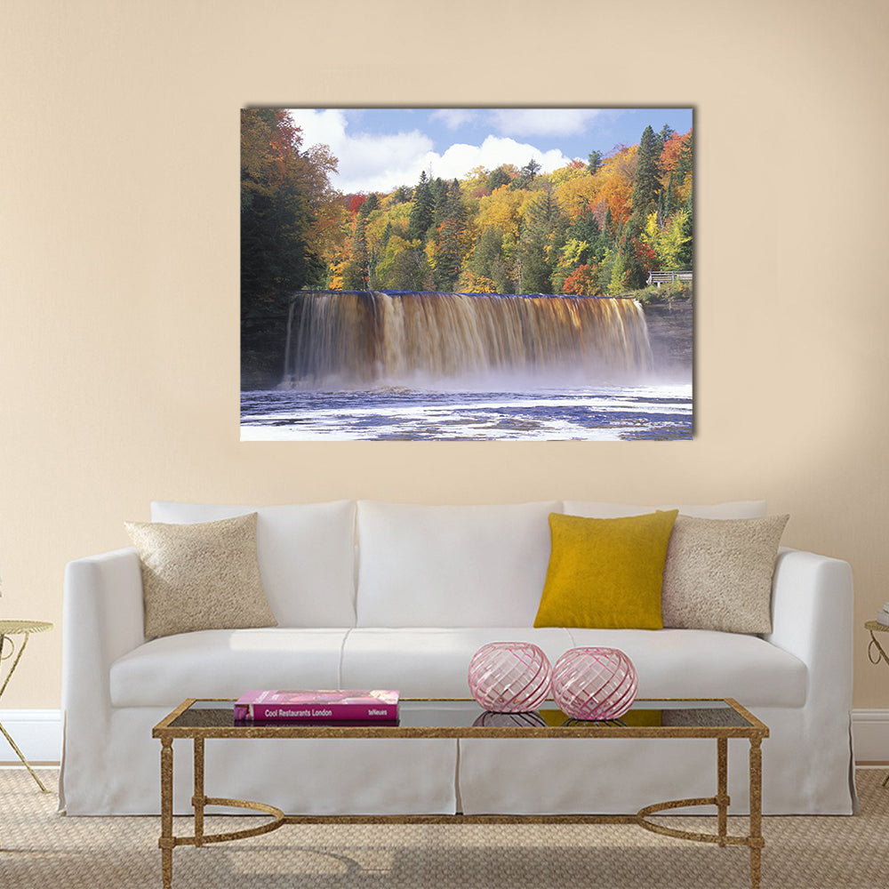 Autumn Waterfall in Michigan Canvas Wall Art in brown, yellow and green, single panel hung on a wall