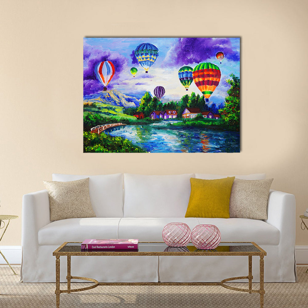 Hot Air Balloons Over River Village Canvas Wall Art in green, blue and purple, single panel hung on a wall