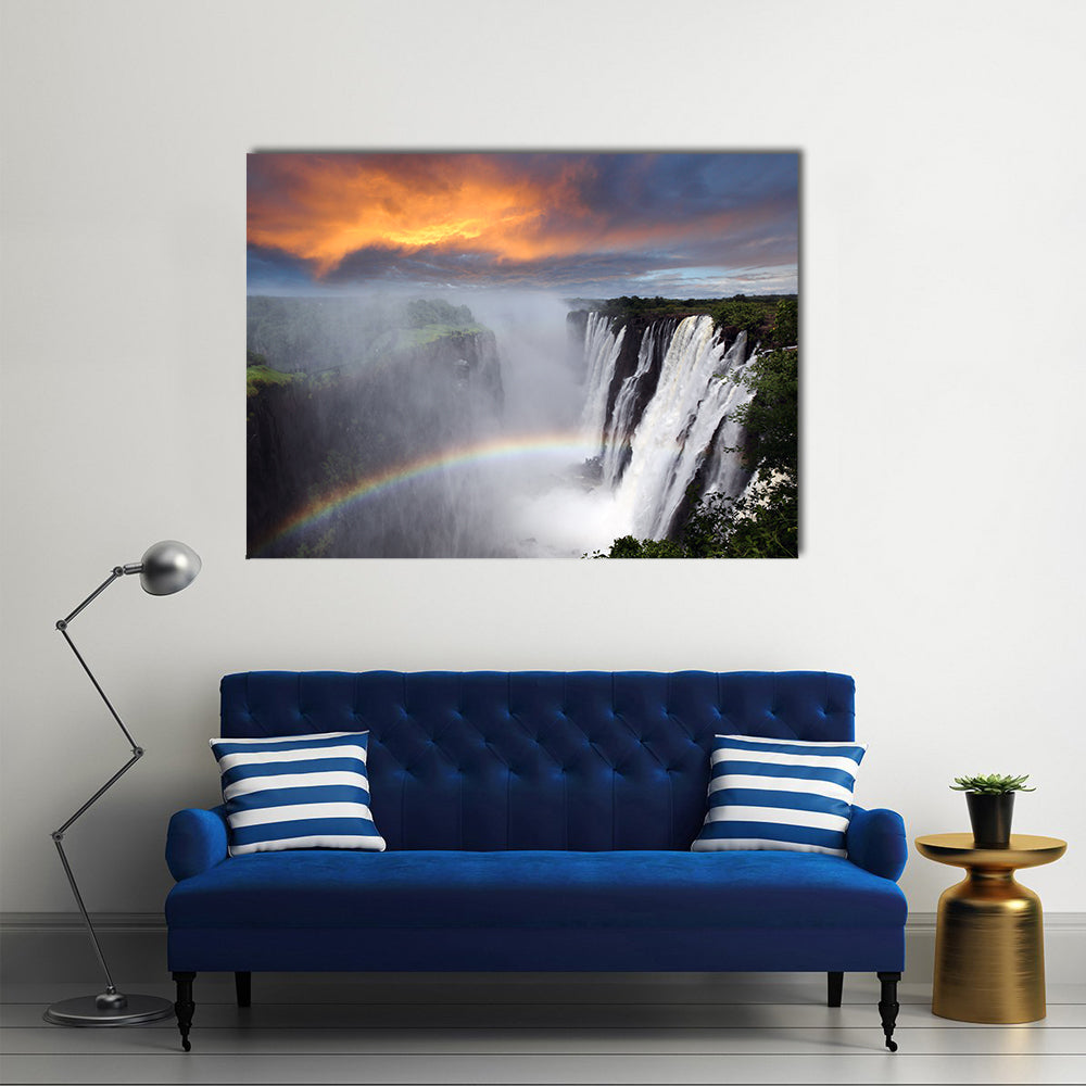 Victoria Falls In Zambia Canvas Wall Art in gray, orange and blue, single panel hung on a wall