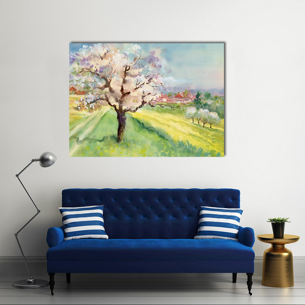 Village Life Watercolor Landscape Canvas Wall Art in yellow, green and blue, single panel hung on a wall