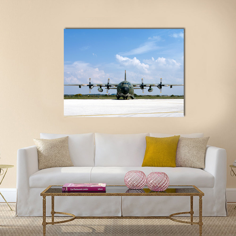Military Airplane Parked At An Airbase Canvas Wall Art