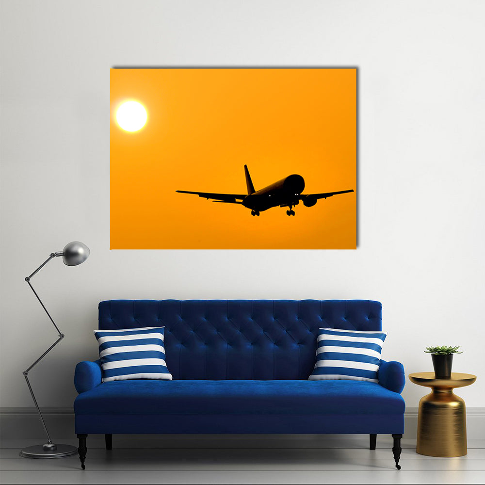 Aircraft Landing At Sunset Canvas Wall Art