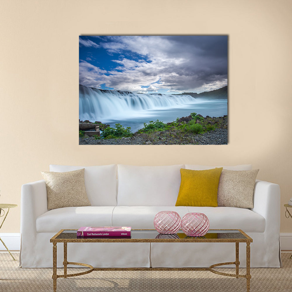 Faxi Waterfall In Iceland Canvas Wall Art in white, gray and blue, single panel hung on a wall