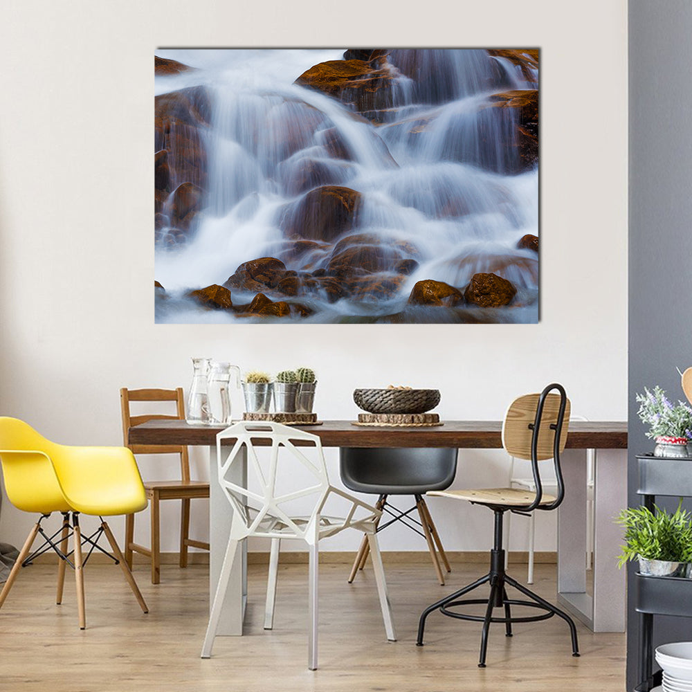 Waterfall in Rocky Mountain National Park Canvas Wall Art in white, brown and blue, single panel hung on a wall