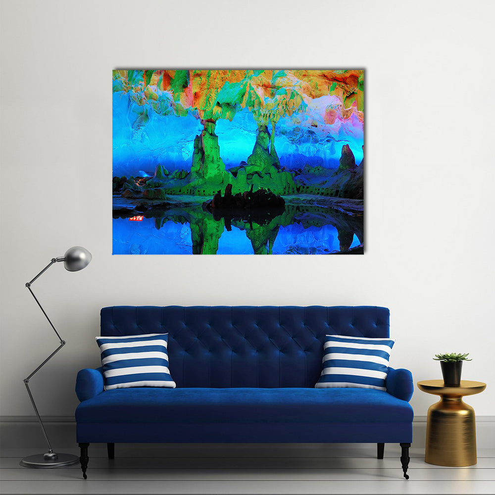 Guilin Limestone Cave with Reflective Pool Canvas Wall Art in green, blue and multicolor, single panel hung on a wall
