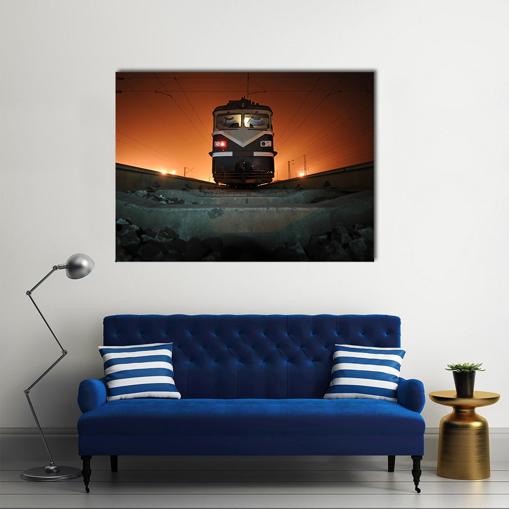 Chinese Electric Train at Night Canvas Wall Art in black, gray and orange, single panel hung on a wall
