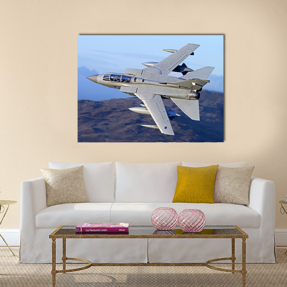 Tornado Gr4 Fighter Jet Over Mountains Canvas Wall Art in gray, brown and blue, single panel hung on a wall