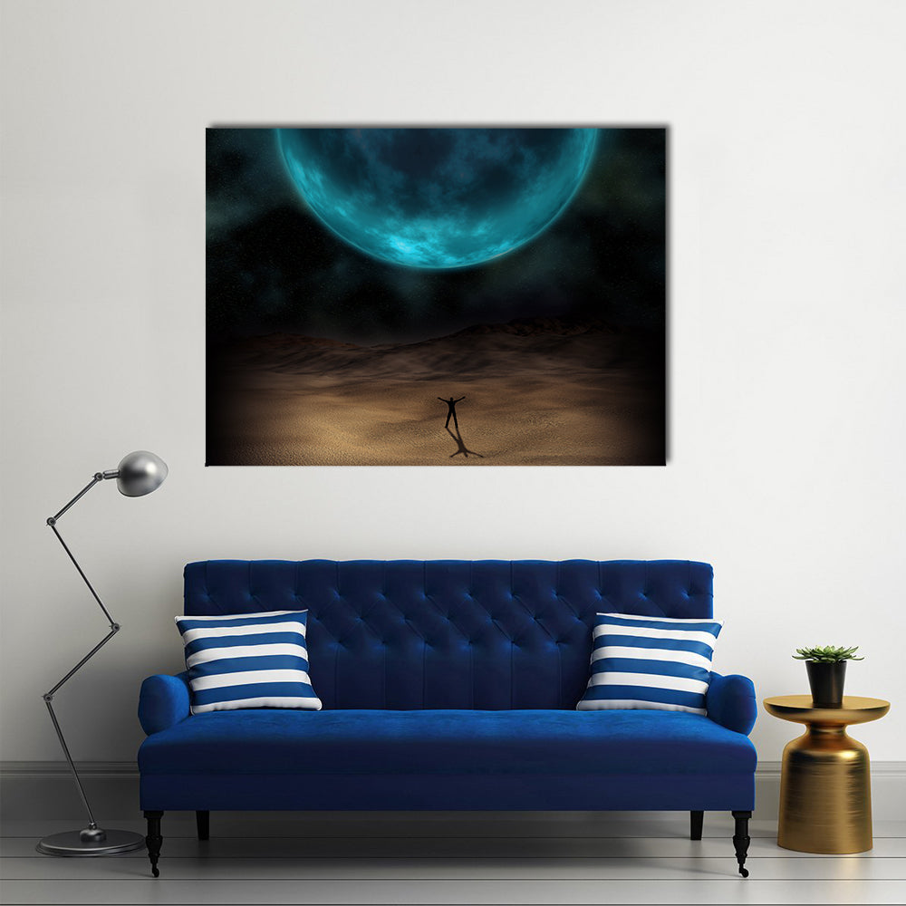 Silhouetted Figure Beneath Giant Blue Planet Canvas Wall Art