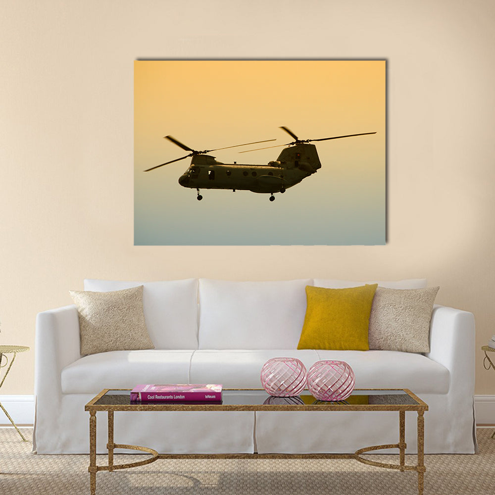 Military Cargo Helicopter In Flight At Dawn Canvas Wall Art