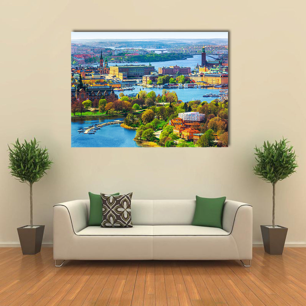 Old Town Gamla Stan In Stockholm Canvas Wall Art in orange, green and blue, single panel hung on a wall