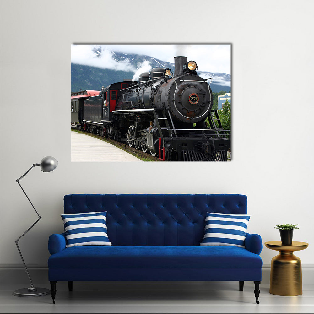 Number 73 Steam Locomotive Departing Station Canvas Wall Art in black, white and gray, single panel hung on a wall