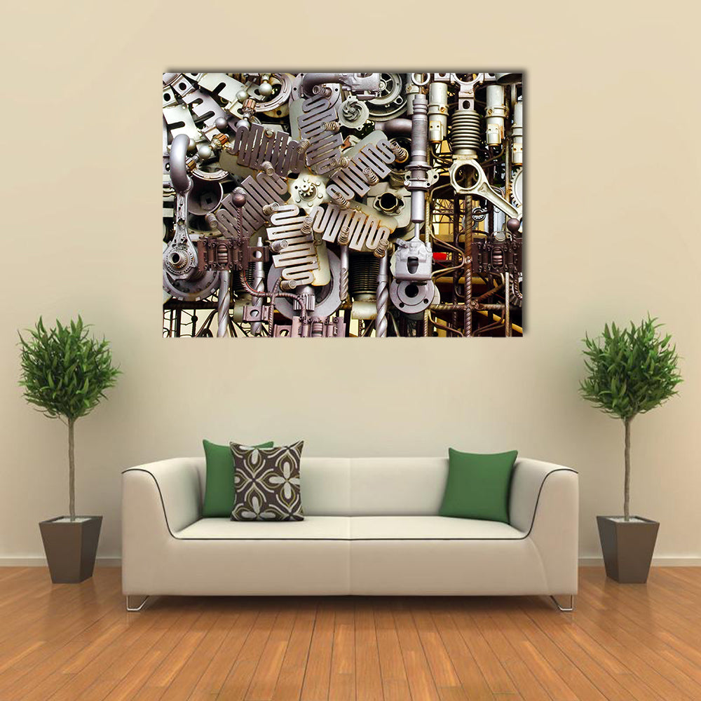 Assembled Metal Machine Parts Canvas Wall Art in gray and silver, single panel hung on a wall