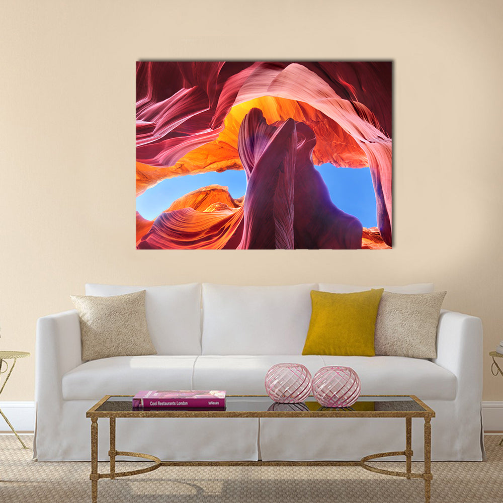 Antelope Canyon In Navajo Reservation Arizona Canvas Wall Art in red, orange and purple, single panel hung on a wall