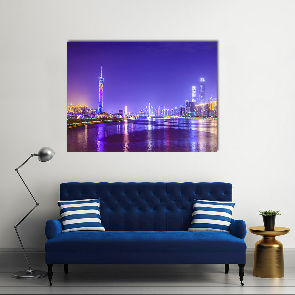 Guangzhou Skyline Over Pearl River Canvas Wall Art in gold, blue and purple, single panel hung on a wall