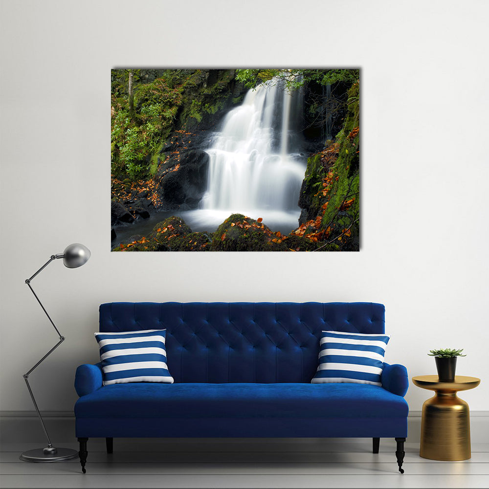 Tobermory Waterfall with Mossy Rocks Canvas Wall Art in white, brown and green, single panel hung on a wall
