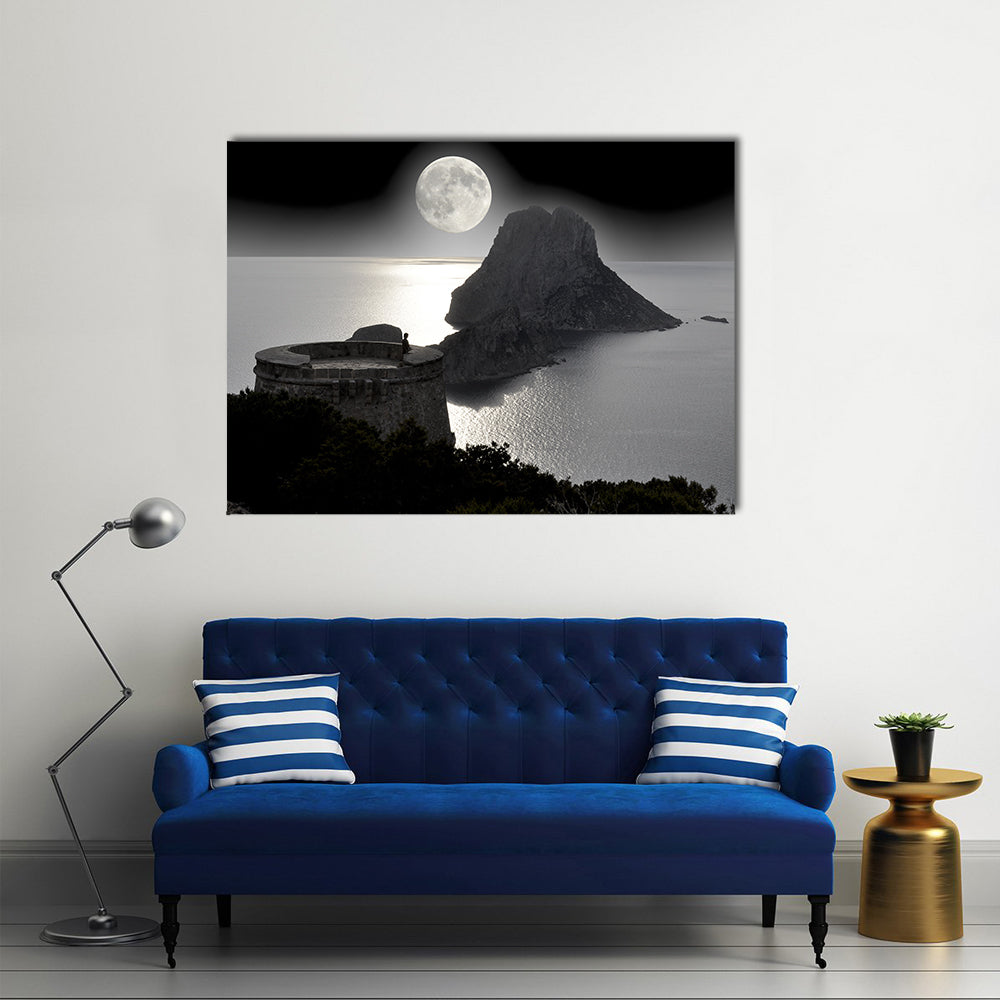 Moonlit Watchtower on Rocky Island Canvas Wall Art in black, white and gray, single panel hung on a wall