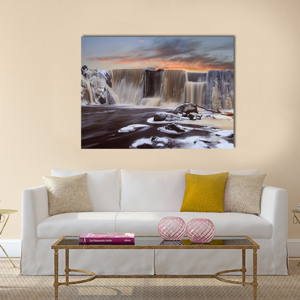 Winter Falls In Finnish Dam Canvas Wall Art in white, brown and orange, single panel hung on a wall