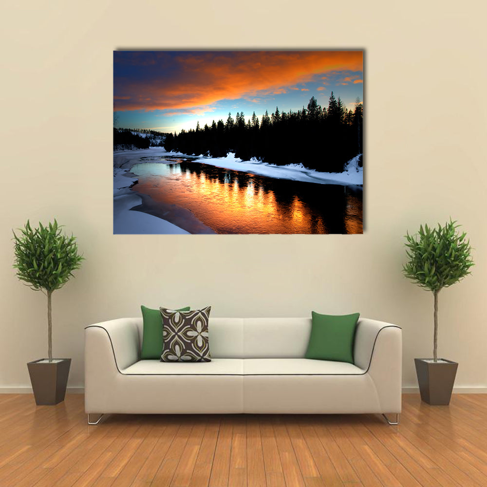 Winter River From Lapland Canvas Wall Art in black, orange and blue, single panel hung on a wall