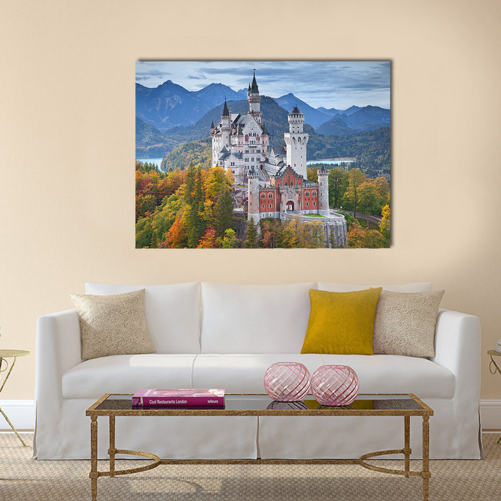 Neuschwanstein Castle with Turquoise Lake Canvas Wall Art in white, green and blue, single panel hung on a wall