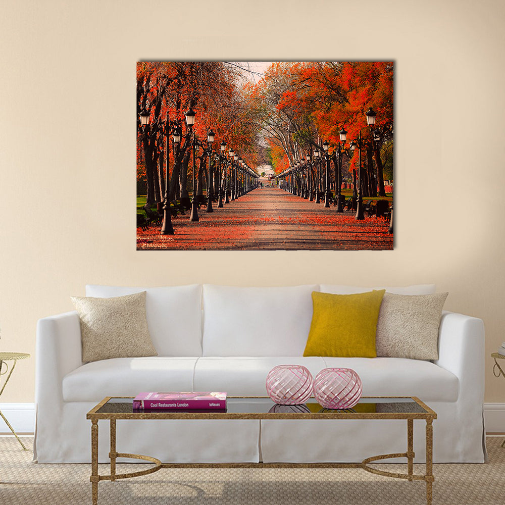 Red Autumn Park Pathway Canvas Wall Art in brown, red and orange, single panel hung on a wall
