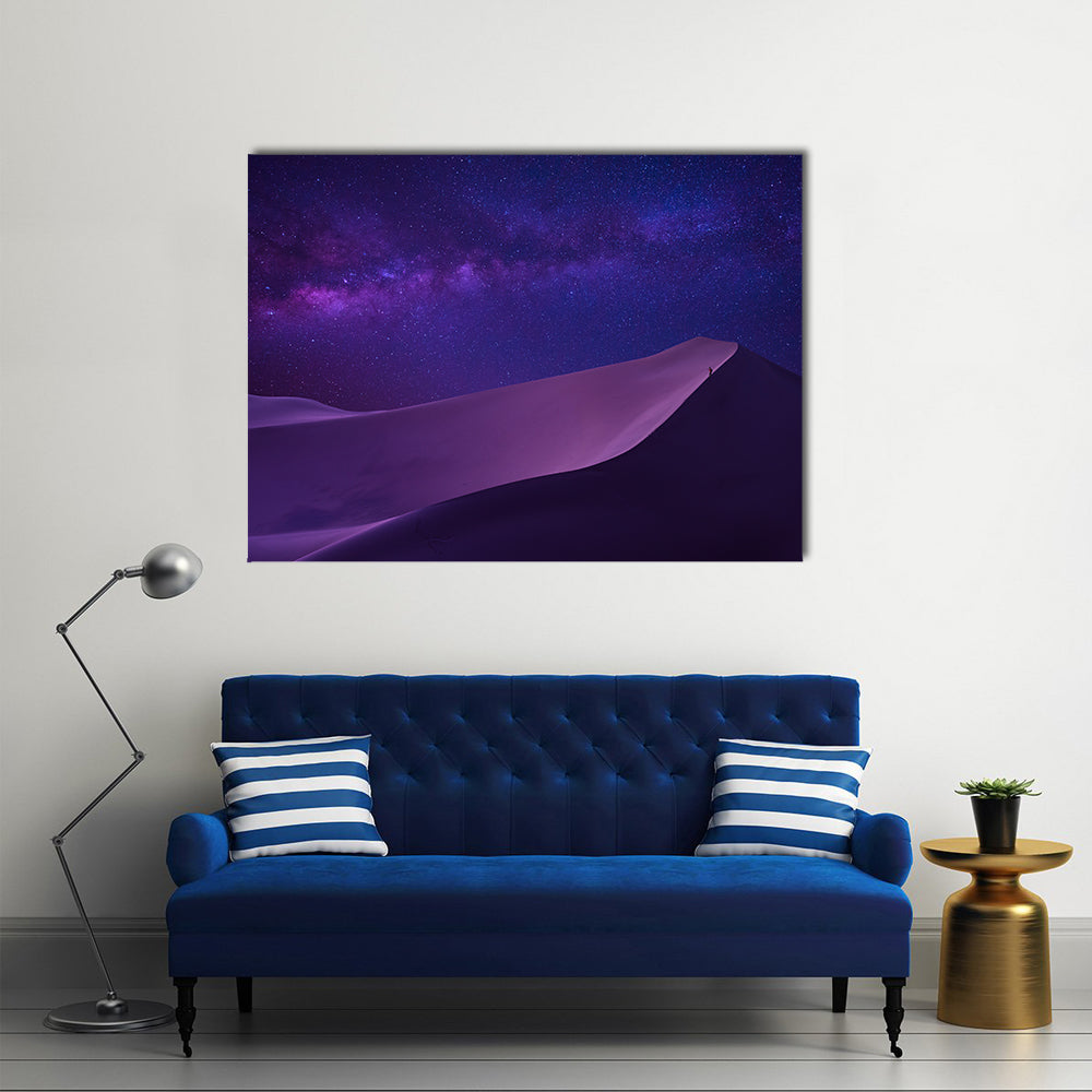 Milky Way Over Sahara Dunes Canvas Wall Art in black, blue and purple, single panel hung on a wall