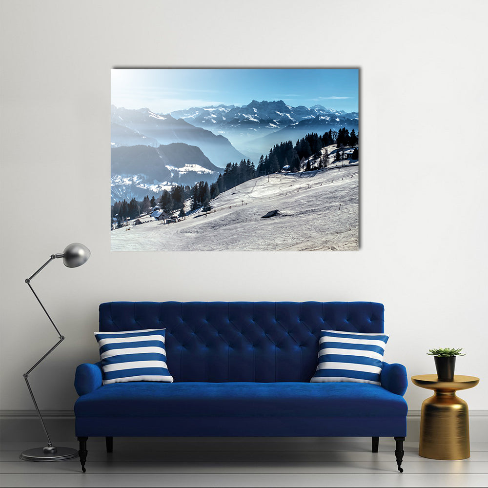 Winter Mountain Ski Slope Canvas Wall Art in white, gray and blue, single panel hung on a wall
