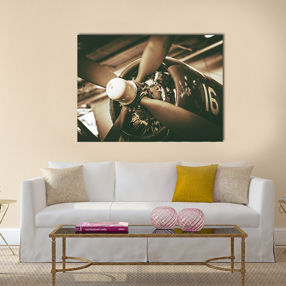 Vintage Military Aircraft Propeller Closeup Canvas Wall Art in black, beige and brown, single panel hung on a wall