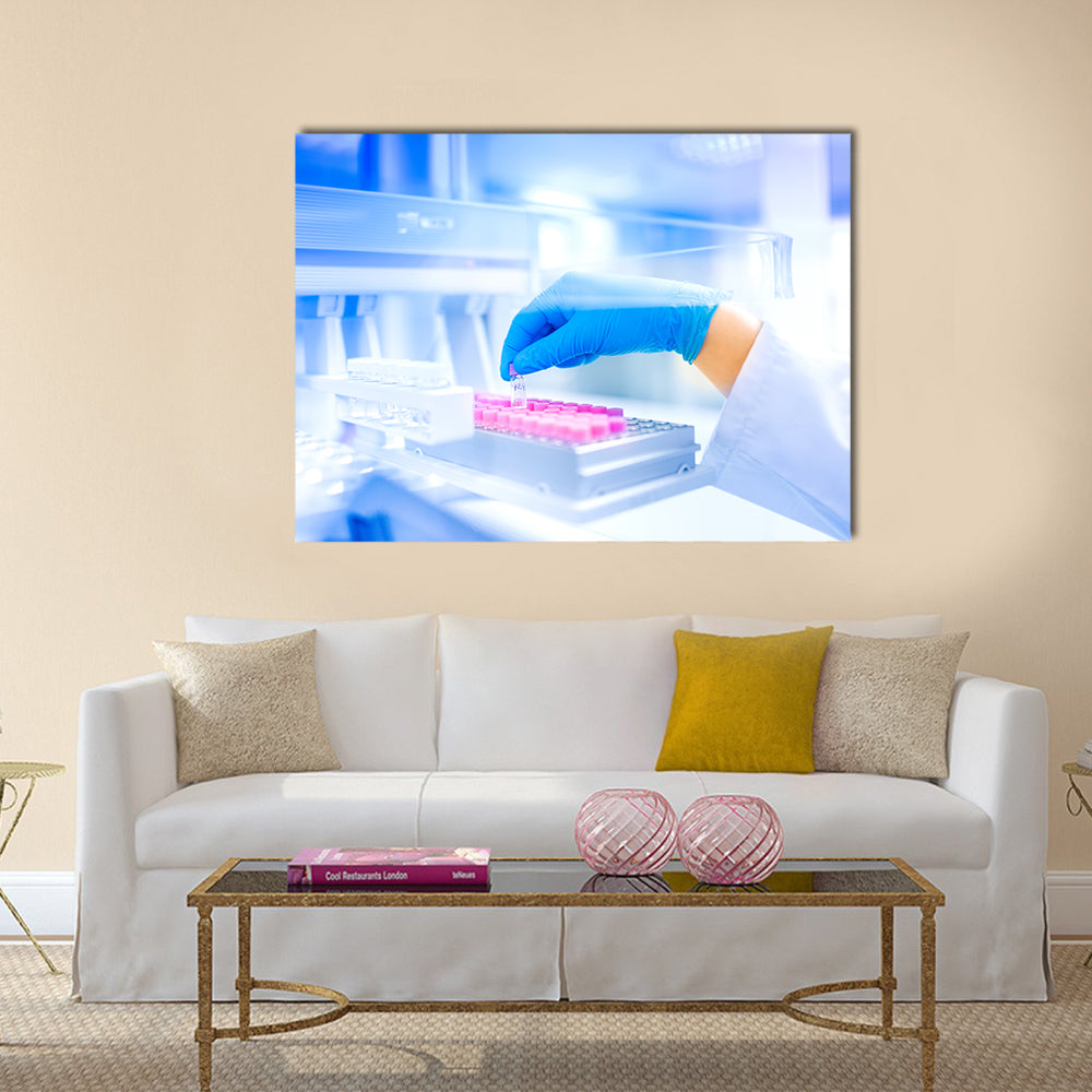 Hand Holding Vial in Medical Laboratory Canvas Wall Art