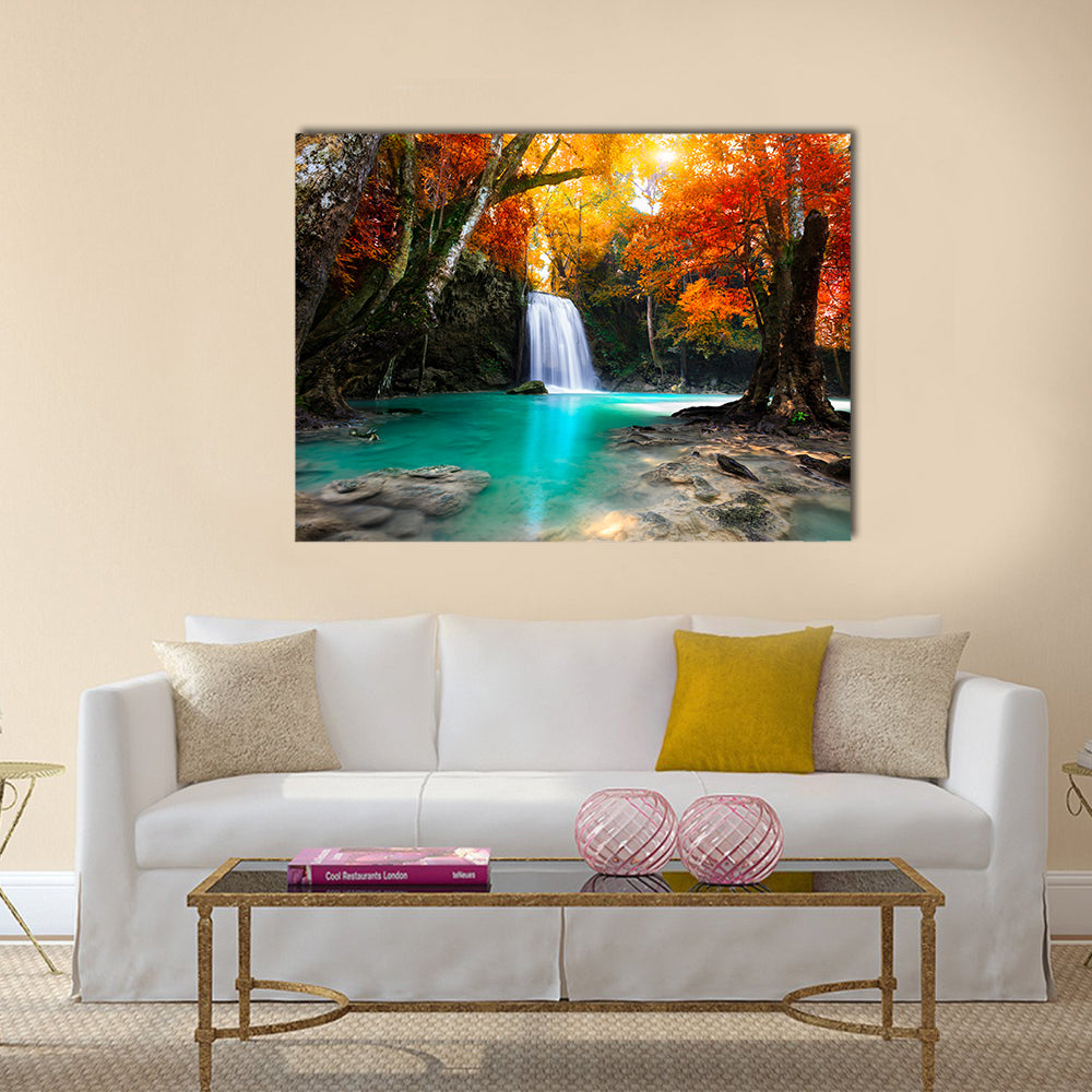 Deep Forest Waterfall In Kanchanaburi Thailand Canvas Wall Art in orange, green and blue, single panel hung on a wall