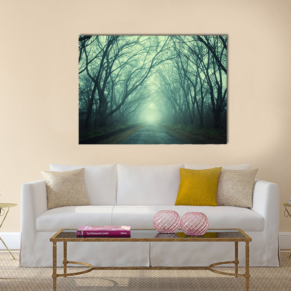 Mysterious Path In Dark Autumn Forest Canvas Wall Art in black, gray and green, single panel hung on a wall